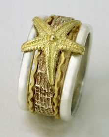 'Stacking Ring' in mixed metals with Starfish Motif in gold